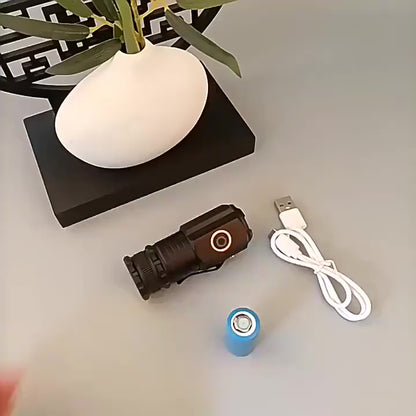 Mini linterna táctica de 3 LED. Recargable.